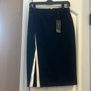 BCBG Max Azria Black pencil skirt with slit and white detailing size 0 tags on